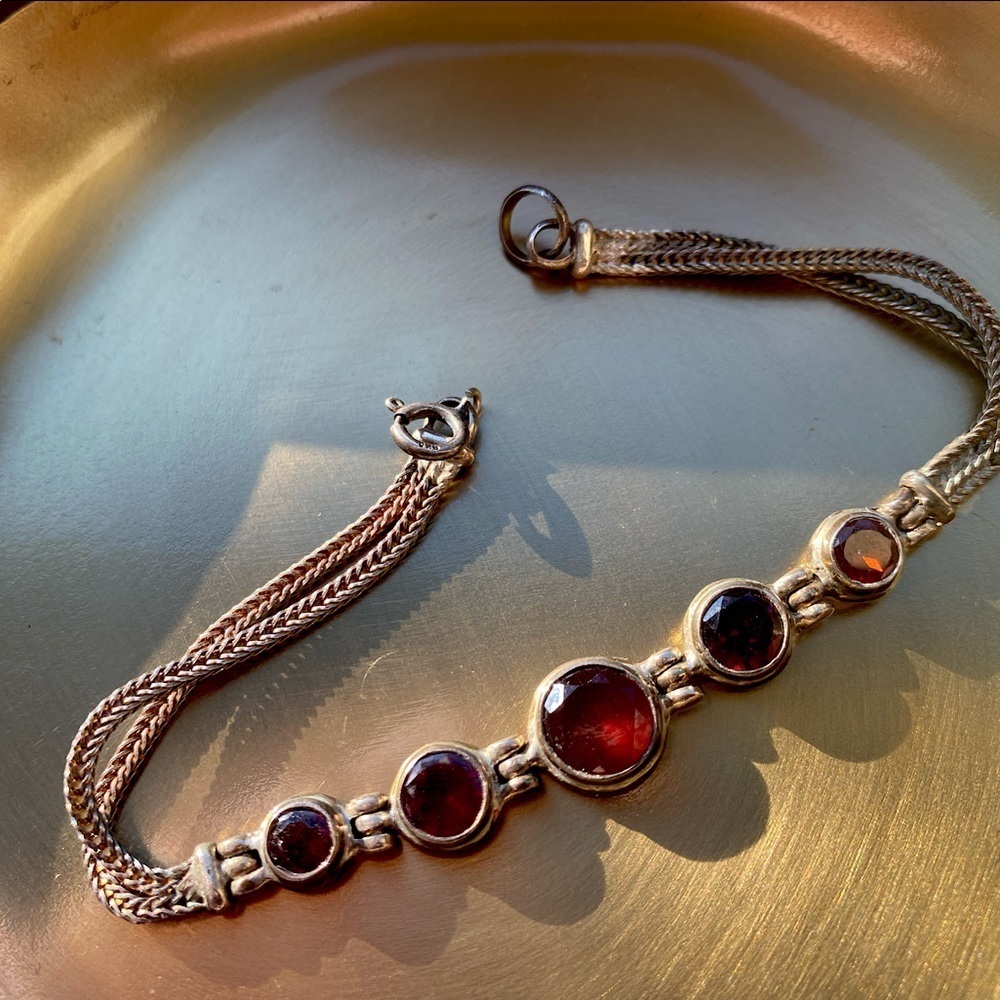 925 Sterling Silver and garnets bracelet 8.9g